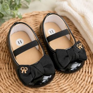 Ballerinas de Charol Negro con Moño de Gros y Broche Dorado para Bebé Niña